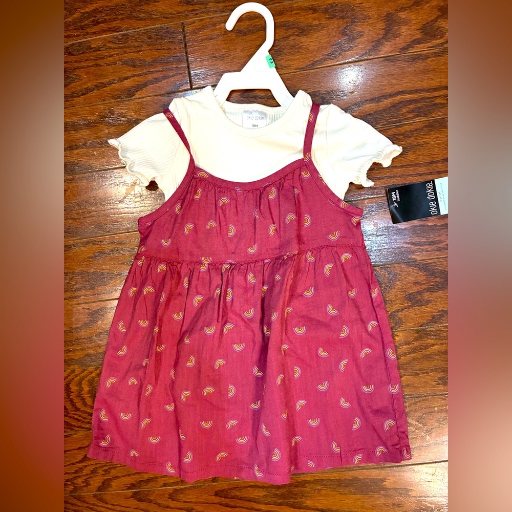 Pink Patterned Dress with White Top
by Okie Dokie.